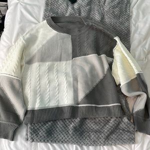 Grey white and dark grey colored block sweater